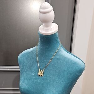 Elegant Goldtone Flute Necklace